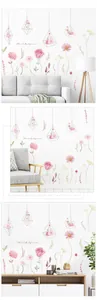 Close-up of watercolor floral wall stickers featuring pink flowers and geometric frames