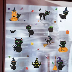 Stickers Halloween avec chats noirs mignons, citrouilles et château sur une vitre lisse
