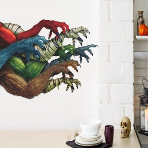 Creepy monster hand wall stickers for Halloween decor on a white brick background