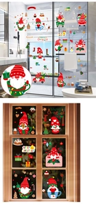 Detail of Christmas window stickers with festive gnomes, trees and Merry Christmas text