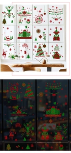 Detail of red and green glitter Christmas window decals with reindeer and tree patterns