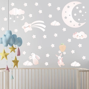 Cartoon moon and stars wall sticker display on nursery wall with rabbit and clouds