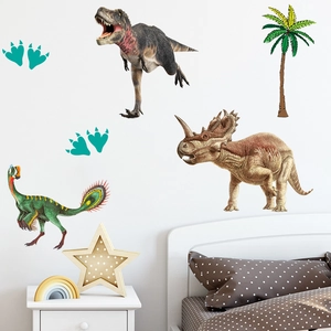 Detail of dinosaur wall stickers and palm tree decals in a cozy children room setting