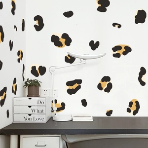 Self-adhesive leopard print wall stickers for modern home decor in yellow and black