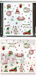 Detail view of festive Santa and reindeer window static stickers on glass surfaces