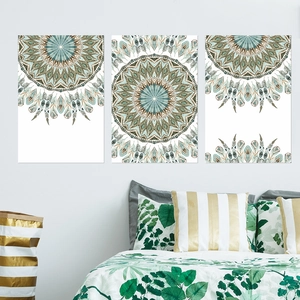 Detail view of ethnic mandala and feather wall art stickers in bohemian bedroom setting