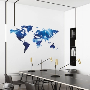 Blue universe galaxy style world map wall decal shown in a modern office meeting room