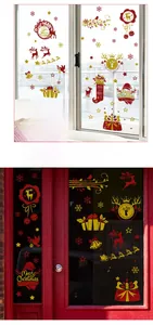 Detailed Christmas window decals featuring glittery red and gold deer and snowflakes