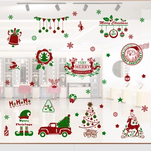 Festive Christmas static window clings featuring Santa and reindeer on glass display