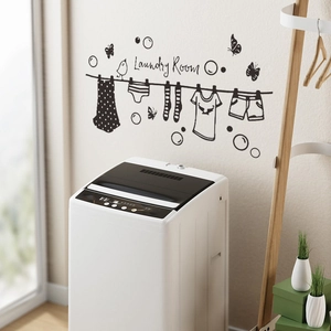 Minimalist black vinyl laundry room wall decal with clothesline and butterfly accents