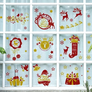 Glittery red and gold Christmas window stickers with reindeer and snowflake designs