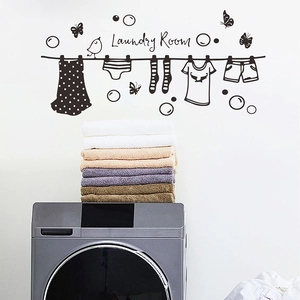Creative laundry room wall sticker with birds and clothesline on a white background