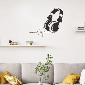 Detail showing creative black gaming headset wall decal with pulse line in modern living room