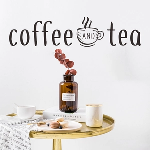 Detail view of coffee AND tea wall sticker on a white wall with minimalist home decor