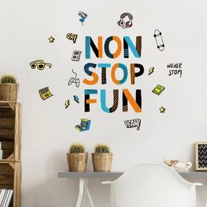 Close-up of game controller wall stickers with Non Stop Fun text in a boy's bedroom