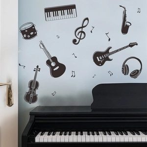Detailed black musical instrument wall decals showing guitar and piano above a real piano