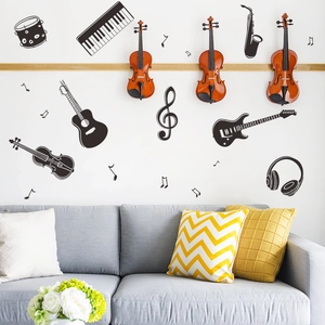 Detail showing music theme wall stickers with guitar and piano keys in a living room
