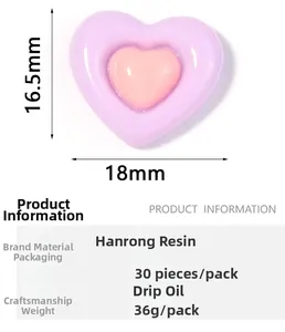 Detail view of 16.5x18mm dual-tone resin heart charms for DIY crafts with size annotations