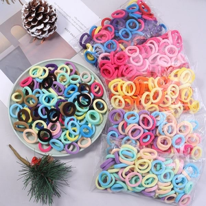Colorful high-elastic seamless hair ties in macaron and morandi tones displayed in a tray