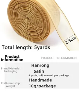 Detailed view of 2.5cm gold sheer organza ribbon spool with 5 yards length for DIY crafts