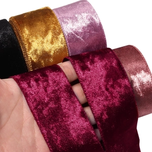 Detail of high-density velvet ribbon rolls in multiple colors for DIY crafts and decor