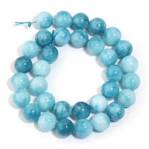 Macro detail of translucent blue sea sediment jasper beads with unique natural textures