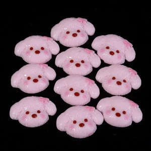 Lote de diez dijes de resina de perritos rosas para fundas de móvil y accesorios de cabello