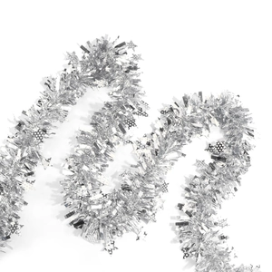 Detailed view of silver sparkling Christmas tinsel with sequin star ornaments and metallic finish