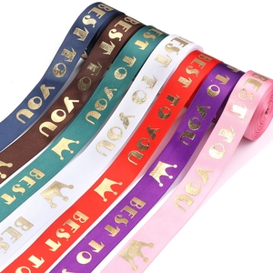 Colorful satin gift ribbons with gold crown and Best To You lettering for party decor