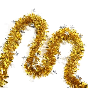 Golden Christmas tinsel garland with silver sequin stars for festive party wall decoration