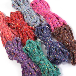 Colorful tweed wool yarn set with speckled fibers for DIY knitting and craft projects