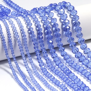 Detail of faceted blue crystal beads in various sizes for DIY jewelry making