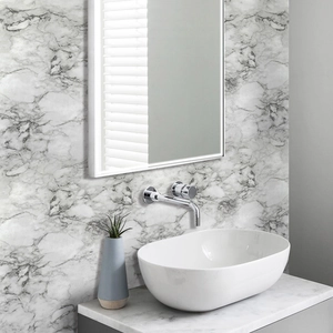 Detail shot of marble textured self-adhesive wallpaper on a modern bathroom wall