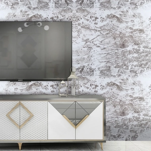 Detail of grey marble textured self-adhesive wallpaper in a modern living room setting