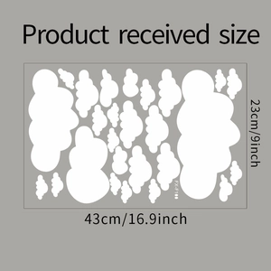 Detailed sheet of white cloud wall stickers showing size dimensions and patterns