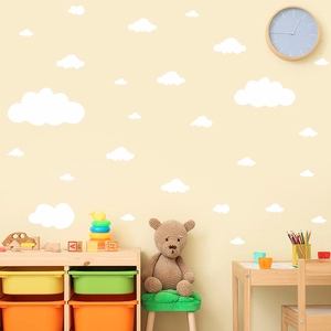 White cloud wall stickers for children bedroom nursery home decor on a warm yellow background