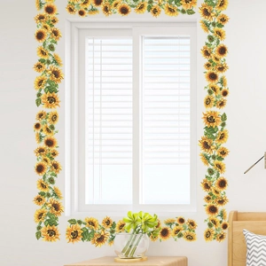 Detail view of yellow sunflower wall stickers applied around a white window frame