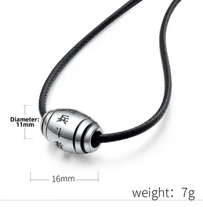 Detail of 11mm titanium steel cylinder pendant with engraved Nine-Character Mantra