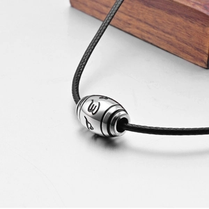 Ethnic style titanium steel bead pendant with religious symbols on black cord necklace