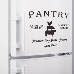 Macro view of black Farmhouse Pantry wall sticker with rooster pig cow silhouettes on white fridge