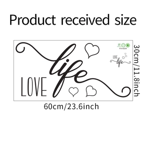 Detail of LOVE LIFE wall sticker layout showing 60x30cm size and artistic black lettering