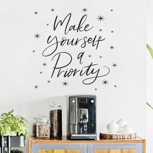 Detail of Make yourself a priority wall decal with stars in a modern coffee bar setting