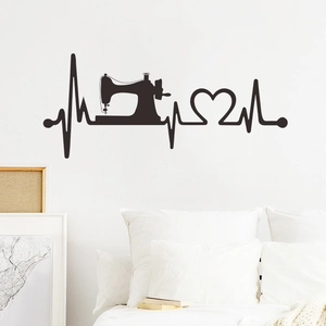 Détail du sticker mural machine à coudre et battement de cœur pour chambre moderne