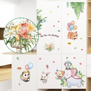 Cartoon animal and green plant wall stickers for kids room decor on white cabinet