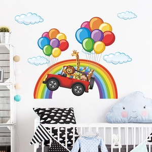 Detailed wall sticker layout featuring cartoon animals in a car with rainbow and balloons