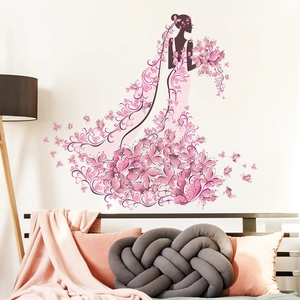 Detailed wall sticker featuring a floral butterfly dress female silhouette in a bedroom