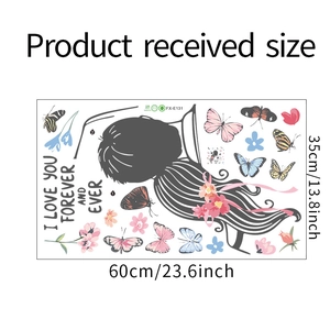 Detail of DIY wall sticker featuring butterflies and girl silhouette measuring 60cm by 35cm