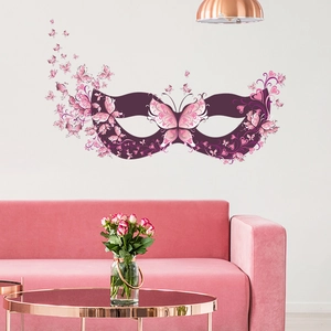 Detailed view of purple butterfly mask wall stickers in a modern pink bedroom setting