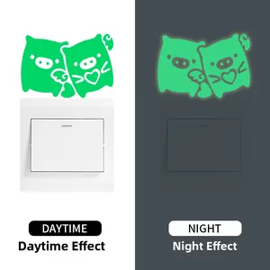 Luminous cartoon pig light switch stickers showing daytime and night glowing effects