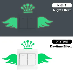 Luminous crown and wings wall switch sticker showing day and night glowing effect